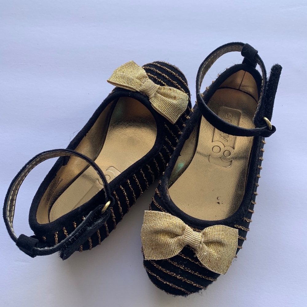 Girls black and gold flats